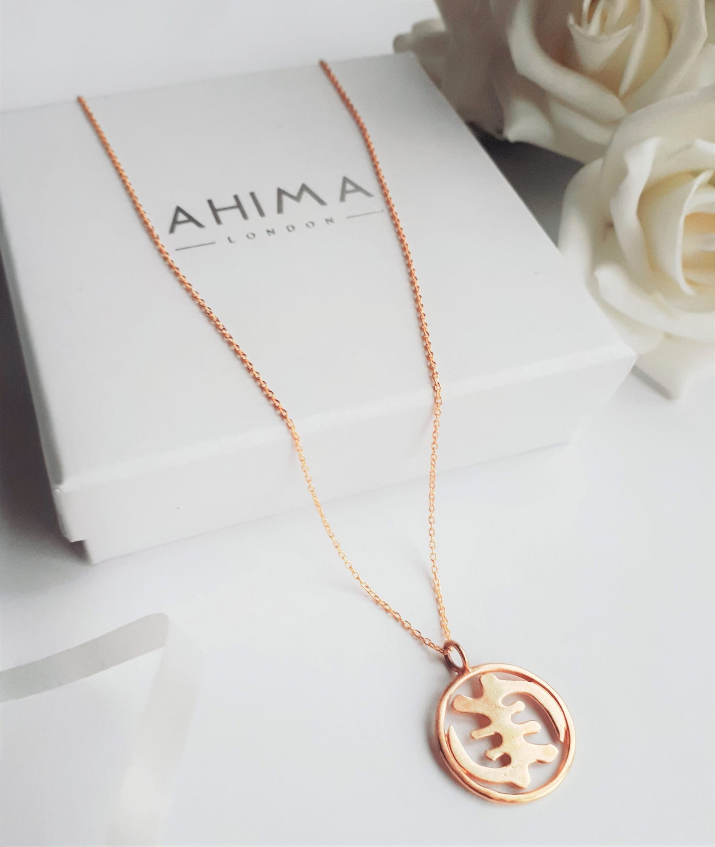 Gye nyame rose gold pendant