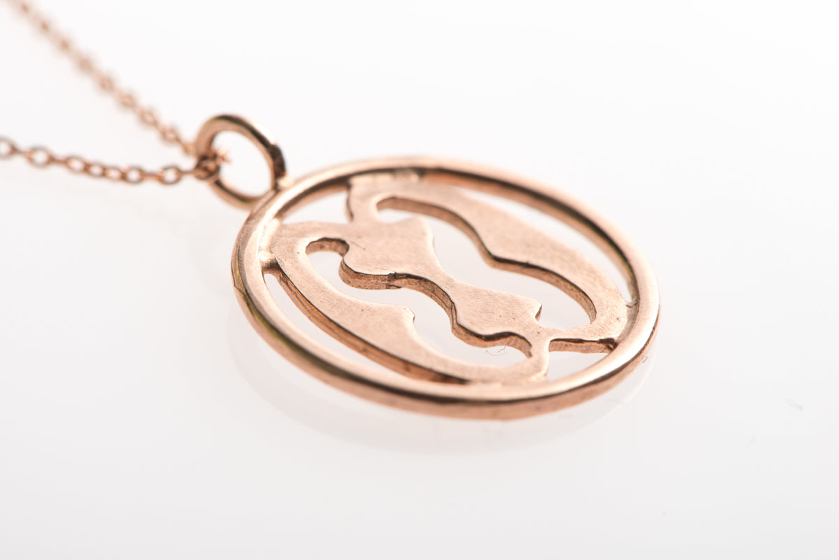 Family adinkra symbol pendant rose gold